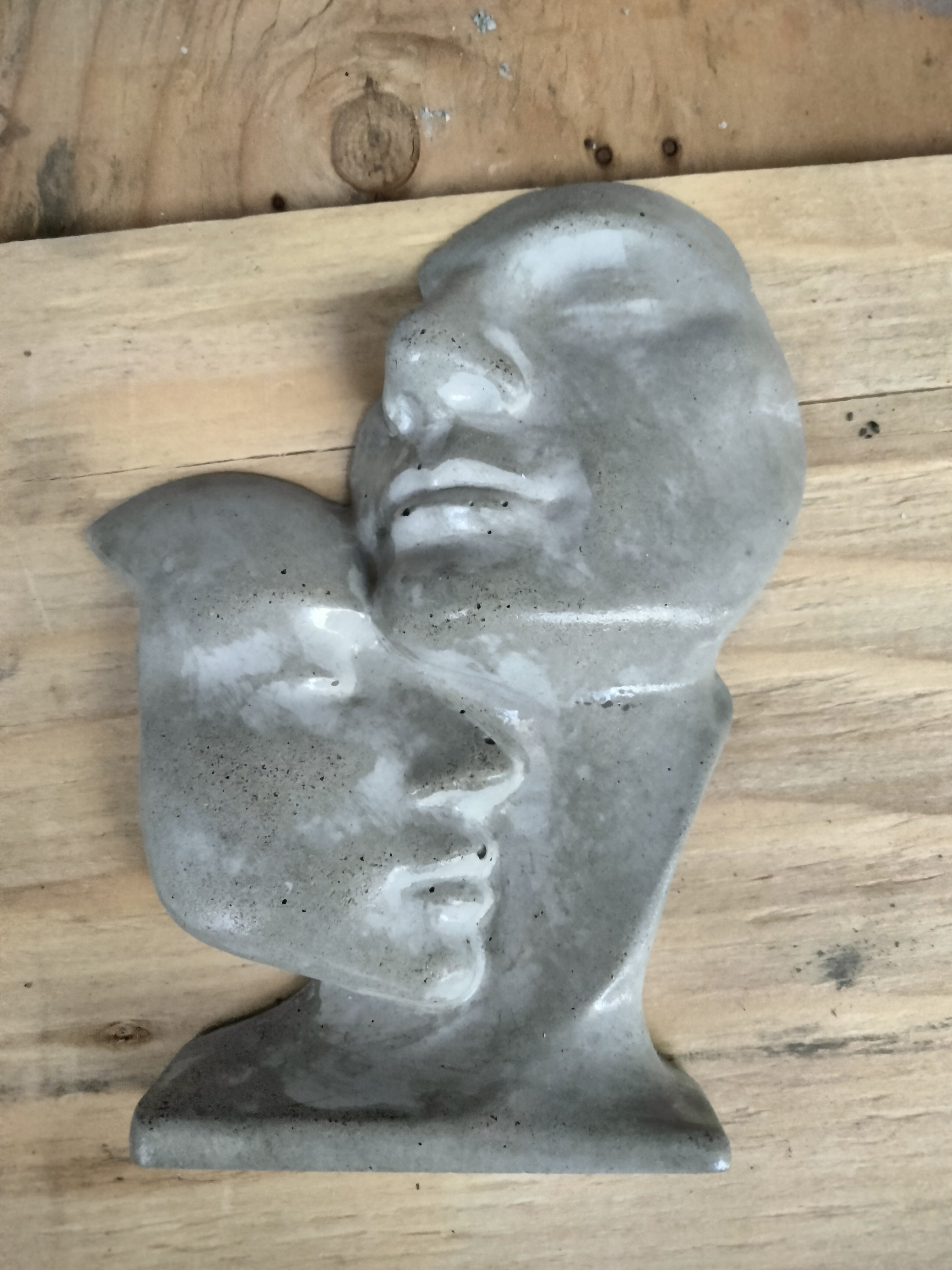 Gray face sculpture